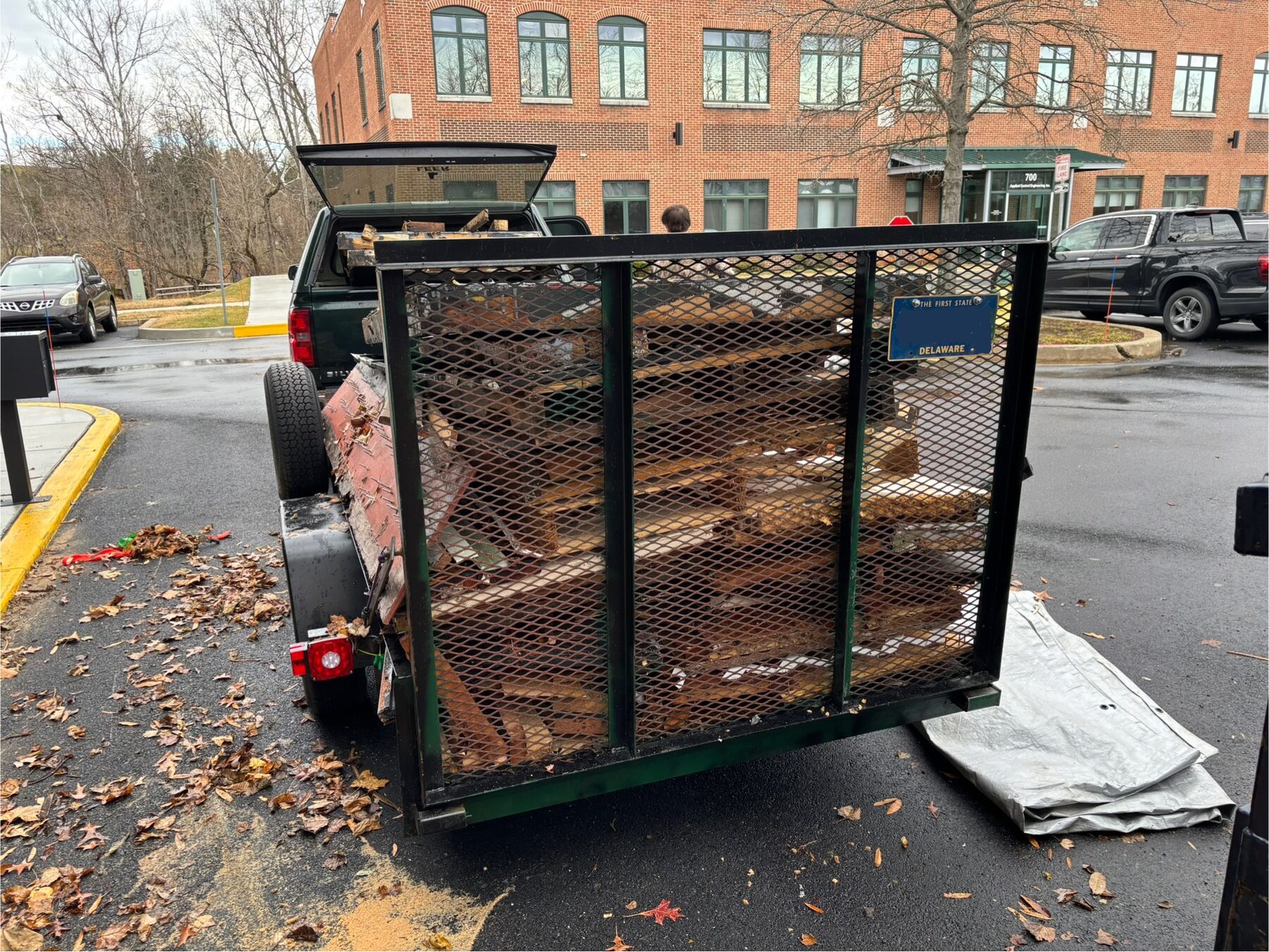 Trailer loaded with commercial cleanout debris