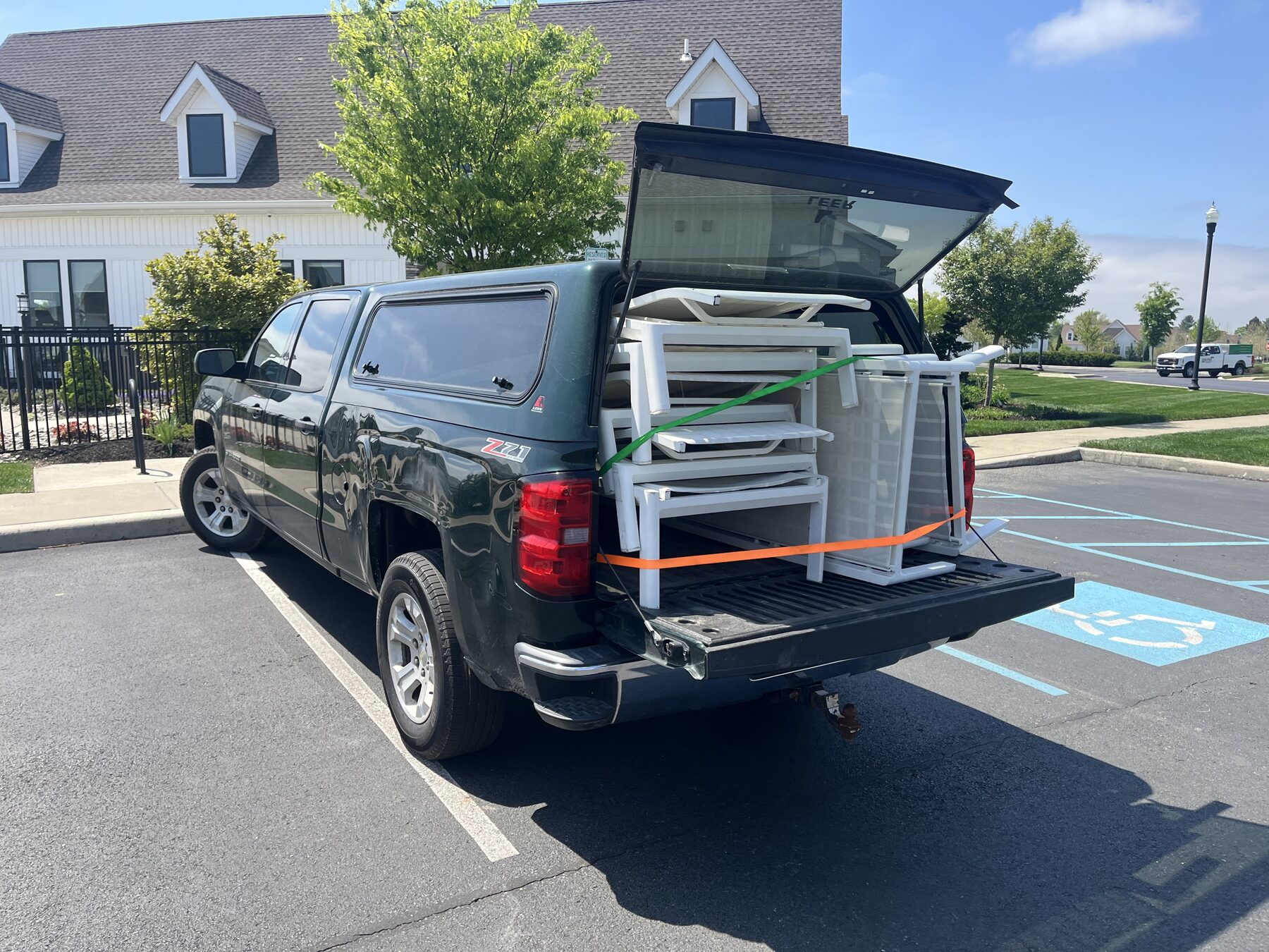Patio furniture set loaded into the truck bed